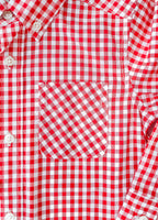 close up of red gingham long sleeve button up shirt.