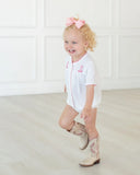 Toddler girl wearing pink hand embroidered cowgirl boots layette set and boots!