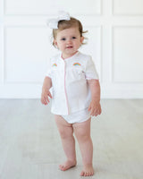 Adorable rainbow layette set that is perfect for your new baby.